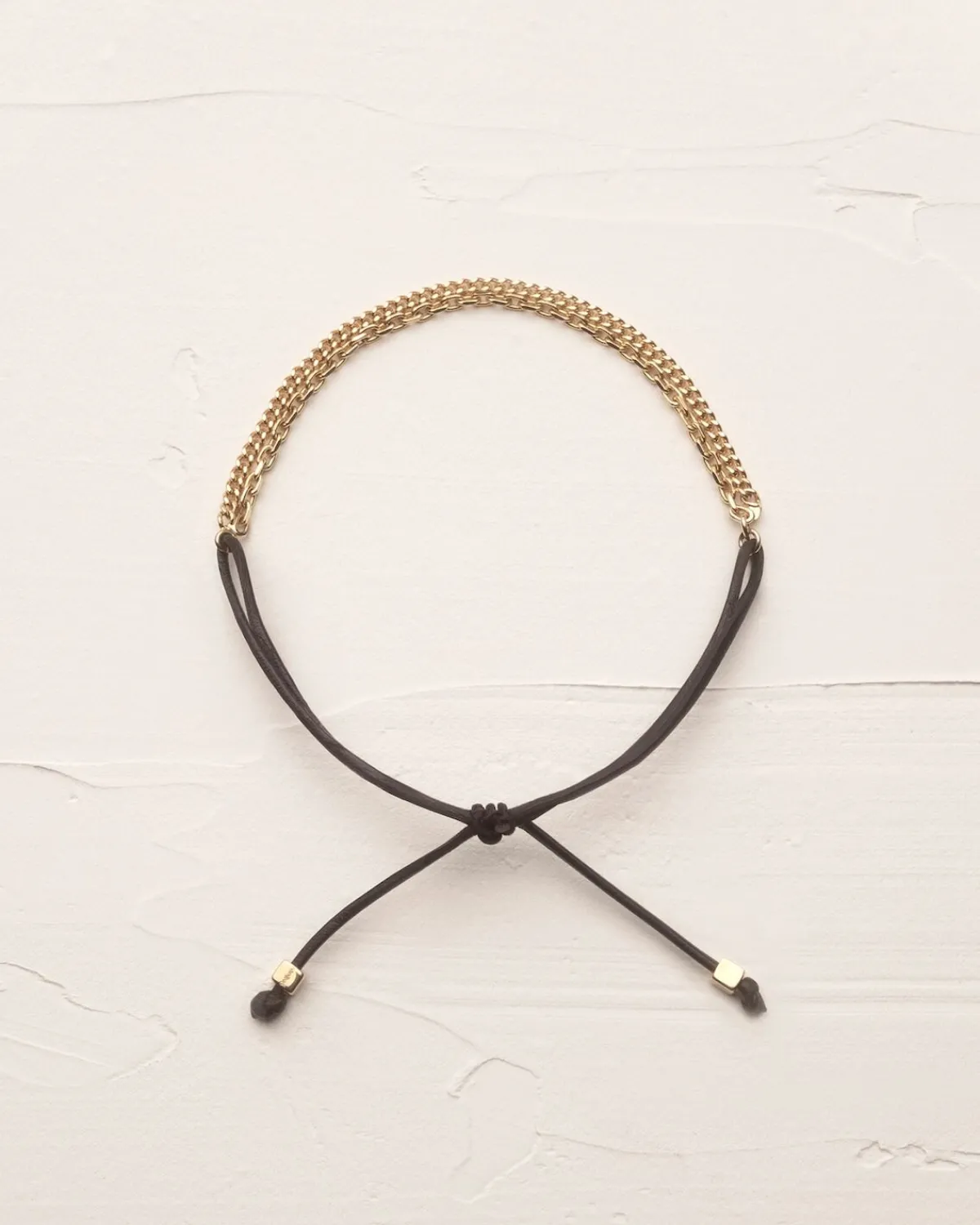 Saint Laurent Fine Jewelry-dual chain bracelet in 18K yellow gold and leather YELLOWGOLDANDBLACK